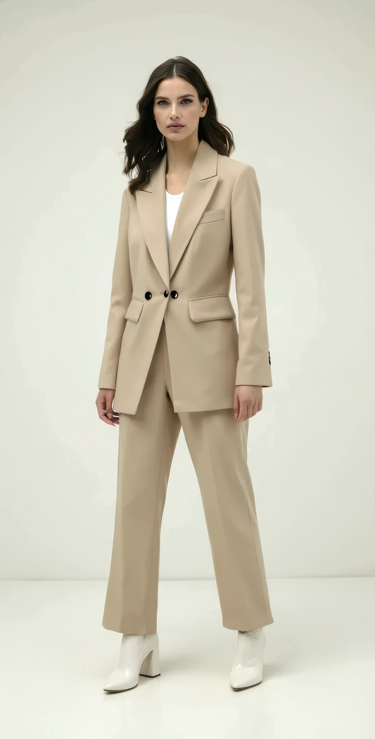 Woman wearing a beige suit with a white background