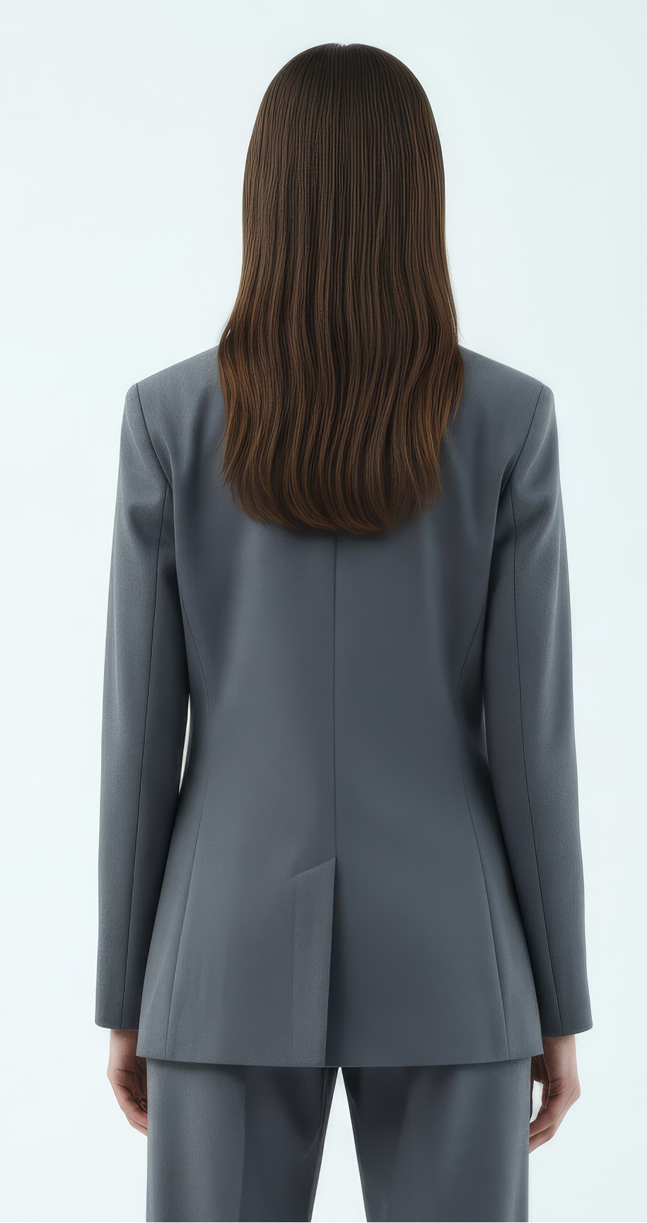 Person wearing a gray suit on a white background